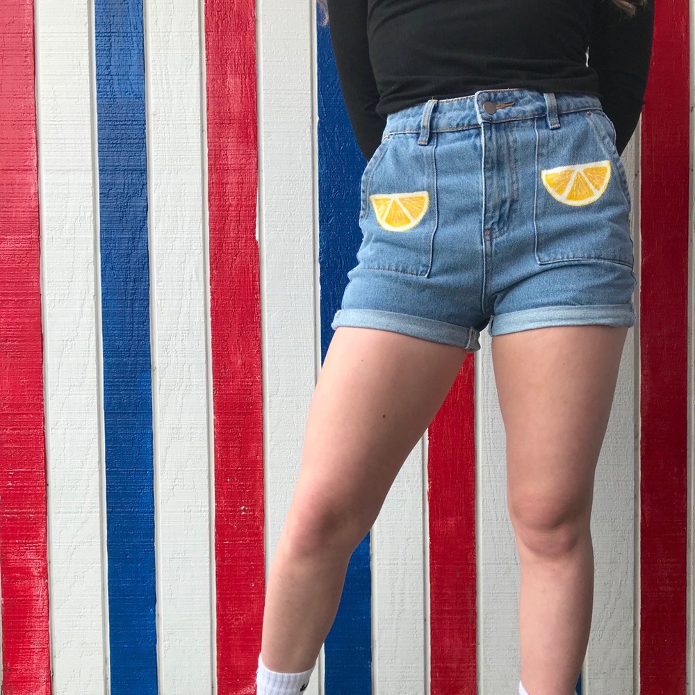 Shorts with a painted acrylic design